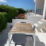 Апартаменты Pina Hideaway With A Sea View Rooftop Terrace